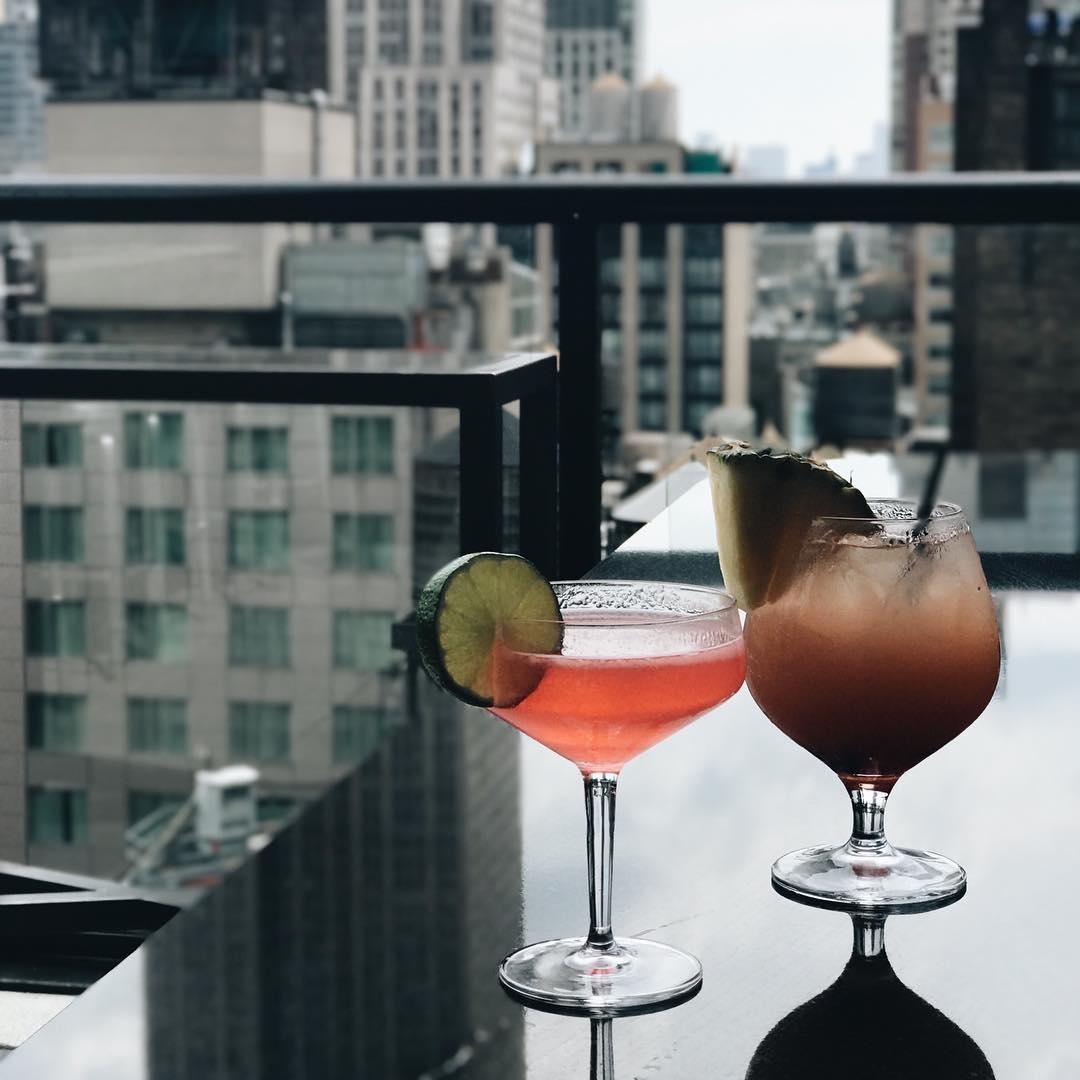 Rainy Friday? Nothin’ a tropical cocktail can’t fix. : @diannnnneee…  #rooftopba…