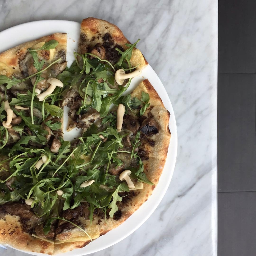 We hear mushrooms are good for you, so we put them on a pizza…. #rooftopbarsnyc …