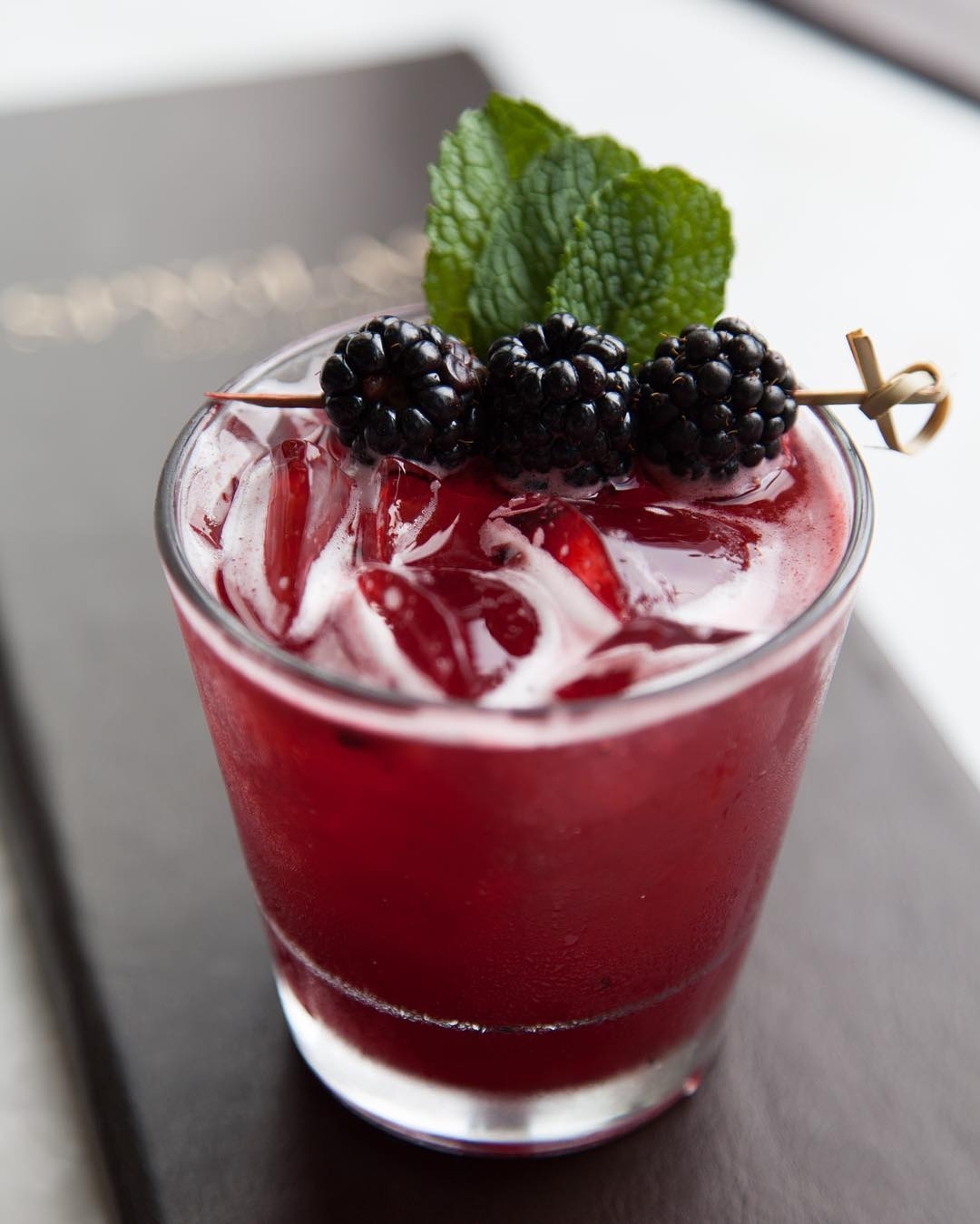 “Maracanã”  Cachaca, lemon juice & cherry heering w/ blackberries & mint!… #roof…