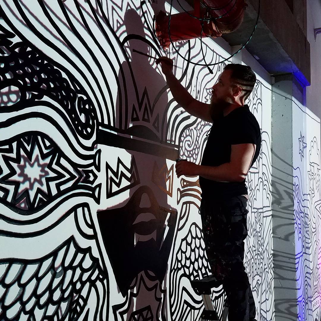 @mdot_season working on a mural at our new location 180 ORCHARD Anything is poss…