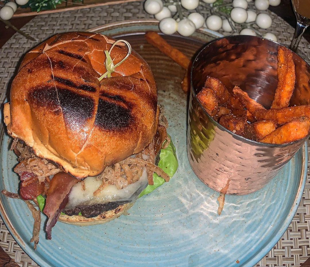 $20 Jerkmi Burger-Brioche bun, gruyere cheese, lettuce, tomato, fried onions, ba…