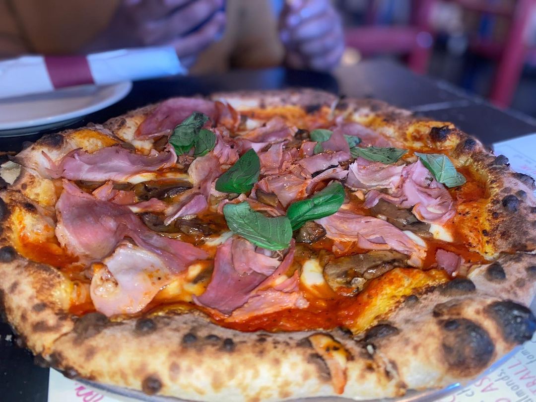 $12 PROSCIUTTO E FUNGHI
(during happy hour)-Tomatoes, Mozzarella, Parmacotto Ham…